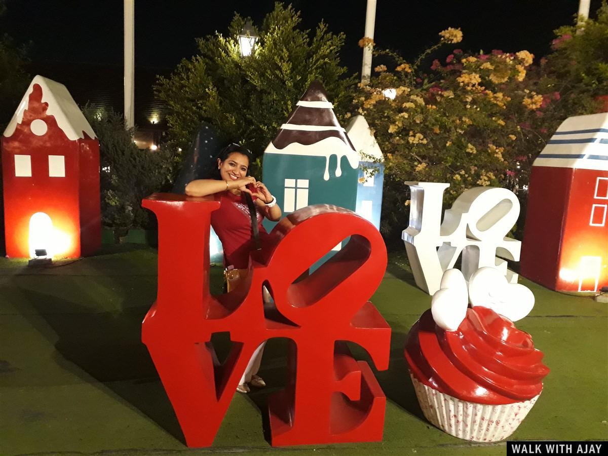 My sister with LOVE sign at Chocolate Ville