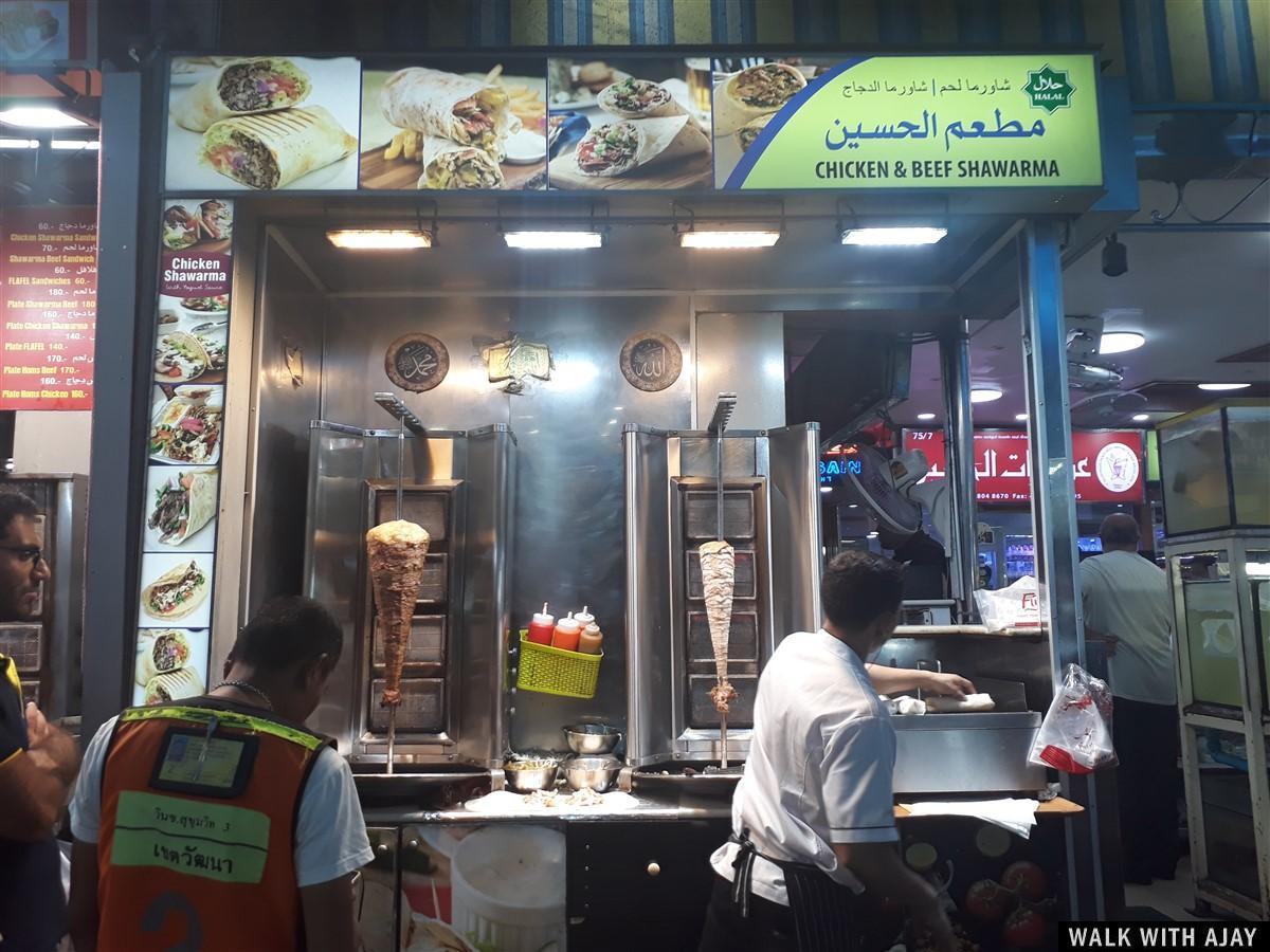 Chef preparing some order beef and chicken shawarma