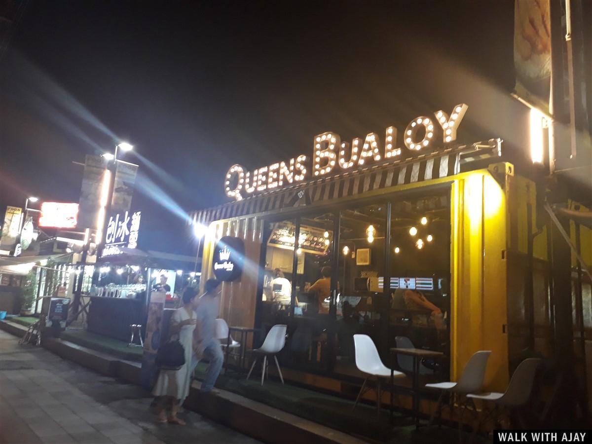 Queens Bualoy shop for food and drinks at street